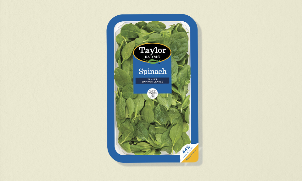 Fresh spinach 10oz package from Taylor Farms, ideal for salads and healthy meals.