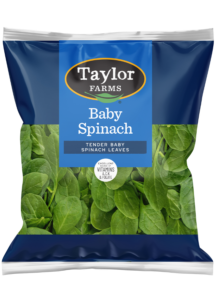 Freshly packaged Taylor Farms salad blend with vibrant greens and vegetables, perfect for healthy meals and quick recipes.