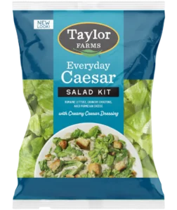 The Taylor Farms Everyday Caesar Salad Kit, with Romaine lettuce, cheesy and garlicky croutons, nutty grated parmesan cheese, and creamy Caesar dressing.