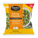 The Taylor Farms Citrus Crunch Mini Chopped Salad Kit package, showing red and savoy cabbage, green leaf lettuce, shredded broccoli, diced almonds, carrots, and green onions, and lemon vinaigrette.