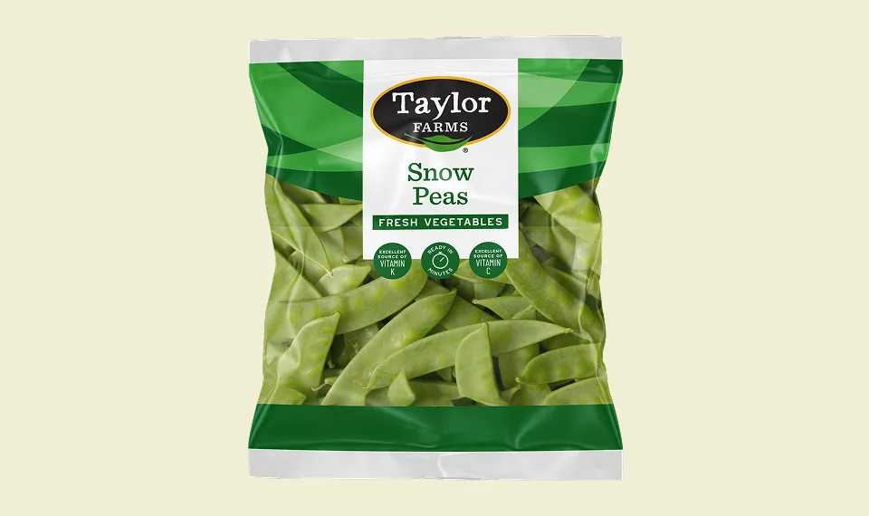 Fresh snow peas packaged for healthy snacking, showcasing vibrant green color and crisp texture.