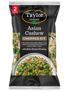 The Taylor Farms Asian Cashew Chopped Salad Kit package, showing cabbage, green cabbage, romaine, carrots, celery, wonton strips, sesame seeds, cashews, almonds, cilantro, and Asian sesame dressing.