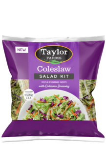 The Taylor Farms Coleslaw Salad Kit package, showing shredded green and red cabbage, carrots, and the included coleslaw dressing.