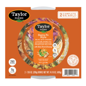 The Taylor Farms Santa Fe Salad Bowl package, showing chopped lettuce, carrot, and cabbage, white meat chicken, roasted corn, and shredded cheese.