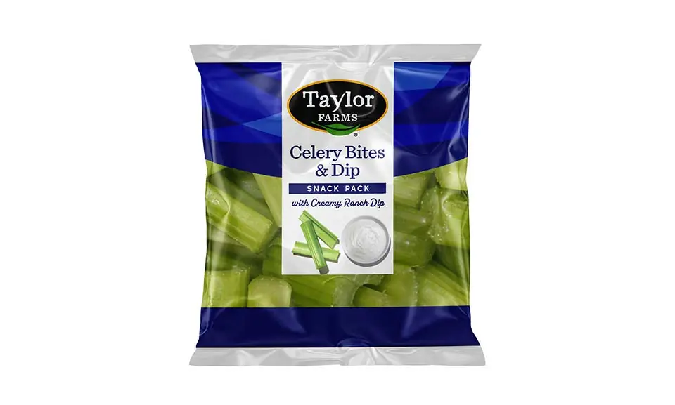 The Taylor Farms Celery Bites & Dip package, showing stalks of celery and a cup of ranch dip.