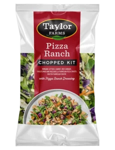 Taylor Farms Pizza Ranch Chopped Salad Kit with fresh ingredients in a vibrant presentation.