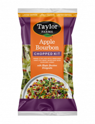 The Taylor Farms Apple Bourbon Chopped Salad Kit package, showing romaine lettuce, diced apples, pieces of smoked gouda, shredded carrots, red cabbage, pieces of uncured smoky bacon, golden honey almonds, and maple bourbon vinaigrette.