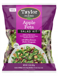 The Taylor Farms Apple Feta Salad Kit package, showing spinach, spring mix, feta cheese bits, almonds, pieces of puffed apple, and white balsamic shallot vinaigrette.