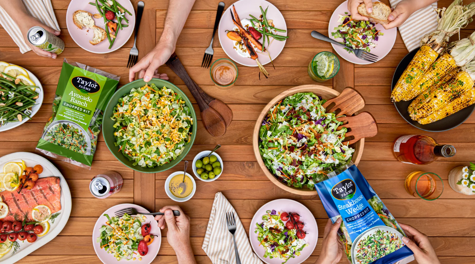 Bird's eye view of people eating food at a picnic table