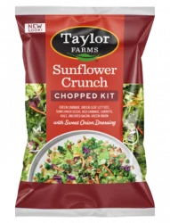 The Sunflower Crunch Chopped Salad Kit, with fresh green leaf, kale, sunflower seeds, and crumbled bacon tossed with a sweet onion coleslaw dressing.