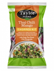 The Thai Chili Mango Chopped Salad kit package, showing chopped cauliflower, Brussels sprouts, broccoli, radicchio, green cabbage, and kale, which are topped off with sunflower seeds, dried mango, toasted quinoa, and a Thai Sweet Chili Vinaigrette dressing.